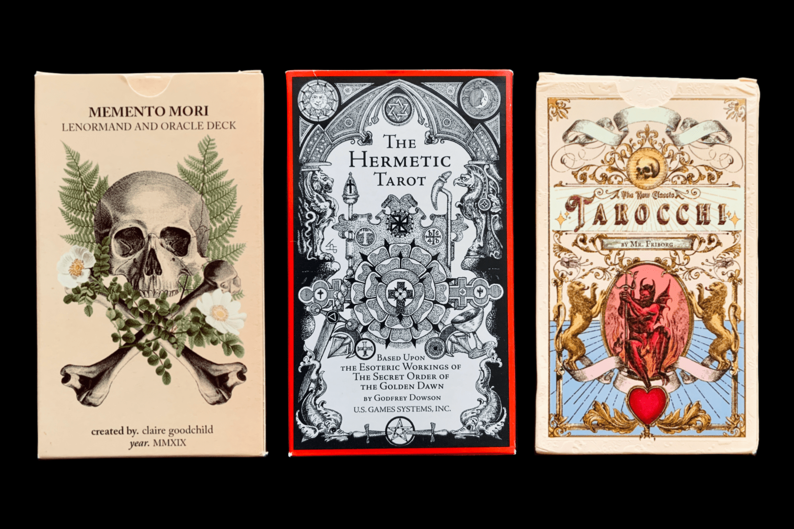 Three different Tarot/Oracle Decks: Memento Mori, The Hermetic Tarot, and Tarocchi